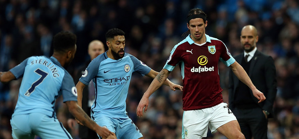 MANCHESTER, ENGLAND - JANUARY 02:  George Boyd of Burnley controls the ball from Raheem Sterling of Manchester City during the Premier League match between Manchester City and Burnley at Etihad Stadium on January 2, 2017 in Manchester, England.  (Photo by Jan Kruger/Getty Images)