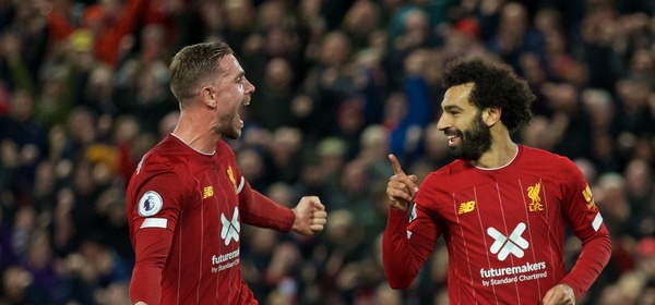 LIVERPOOL, ENGLAND - Sunday, October 27, 2019: Liverpool's Mohamed Salah (R) celebrates scoring the second goal, from a penalty kick, with team-mate captain Jordan Henderson during the FA Premier League match between Liverpool FC and Tottenham Hotspur FC at Anfield. (Pic by David Rawcliffe/Propaganda)