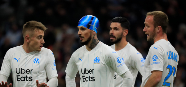 MARSEILLE, FRANCE - MARCH 06: Dario Benedetto of Olympique Marseille reacts with teammates during the Ligue 1 match between Olympique Marseille and Amiens SC at Stade Velodrome on March 6, 2020 in Marseille, France.  (Photo by Guillaume Ruoppolo - OM/Olympique de Marseille via Getty Images)