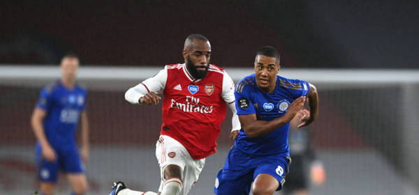 LONDON, ENGLAND - JULY 07: Youri Tielemans of Leicester City and Alexandre Lacazette of Arsenal battle for the ball during the Premier League match between Arsenal FC and Leicester City at Emirates Stadium on July 07, 2020 in London, England. Football Stadiums around Europe remain empty due to the Coronavirus Pandemic as Government social distancing laws prohibit fans inside venues resulting in all fixtures being played behind closed doors. (Photo by Shaun Botterill/Getty Images)