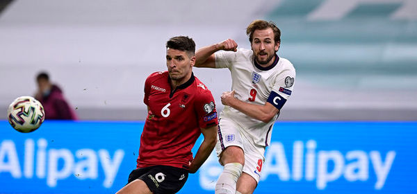 TIRANA, ALBANIA - MARCH 28: Harry Kane of England battles for possession with Berat Djimsiti of Albania during the FIFA World Cup 2022 Qatar qualifying match between Albania and England at the Qemal Stafa Stadium on March 28, 2021 in Tirana, Albania. Sporting stadiums around Europe remain under strict restrictions due to the Coronavirus Pandemic as Government social distancing laws prohibit fans inside venues resulting in games being played behind closed doors.  (Photo by Mattia Ozbot/Getty Images)