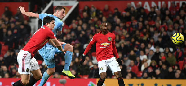 MANCHESTER, ENGLAND - JANUARY 22: Chris Wood of Burnley scores his team's first goal during the Premier League match between Manchester United and Burnley FC at Old Trafford on January 22, 2020 in Manchester, United Kingdom. (Photo by Gareth Copley/Getty Images)