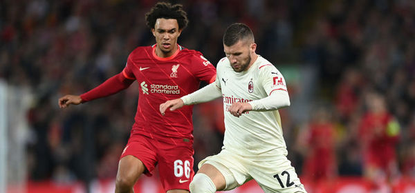 LIVERPOOL, ENGLAND - SEPTEMBER 15: Ante Rebic of AC Milan is challenged by Trent Alexander-Arnold of Liverpool during the UEFA Champions League group B match between Liverpool FC and AC Milan at Anfield on September 15, 2021 in Liverpool, England. (Photo by Shaun Botterill/Getty Images)