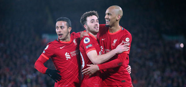 LIVERPOOL, ENGLAND - FEBRUARY 10:  Diogo Jota of Liverpool celebrates with Fabinho and Thiago Alcantara after scoring the opening goal during the Premier League match between Liverpool and Leicester City at Anfield on February 10, 2022 in Liverpool, England. (Photo by Alex Livesey - Danehouse/Getty Images )