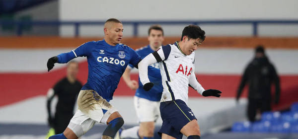 LIVERPOOL, ENGLAND - FEBRUARY 10: Heung-Min Son of Tottenham Hotspur is fouled by Richarlison of Everton during The Emirates FA Cup Fifth Round match between Everton and Tottenham Hotspur at Goodison Park on February 10, 2021 in Liverpool, England. Sporting stadiums around the UK remain under strict restrictions due to the Coronavirus Pandemic as Government social distancing laws prohibit fans inside venues resulting in games being played behind closed doors. (Photo by Clive Brunskill/Getty Images)