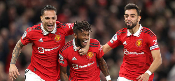 MANCHESTER, ENGLAND - OCTOBER 19: Fred of Manchester United celebrates with team mates Antony and Bruno Fernandes after scoring their sides first goal during the Premier League match between Manchester United and Tottenham Hotspur at Old Trafford on October 19, 2022 in Manchester, England. (Photo by Alex Pantling/Getty Images)