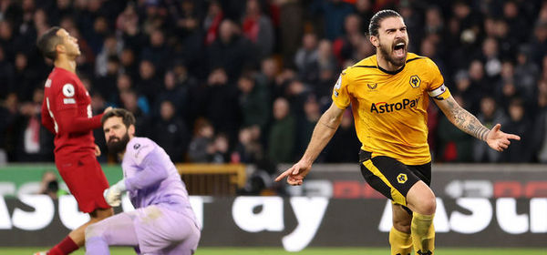 WOLVERHAMPTON, ENGLAND - FEBRUARY 04: Ruben Neves of Wolverhampton Wanderers celebrates after scoring the team's third goal during the Premier League match between Wolverhampton Wanderers and Liverpool FC at Molineux on February 04, 2023 in Wolverhampton, England. In a Premier League first, both sets of players, and match officials, will wear Green Football Weekend sustainable green armbands to highlight the initiative and put the conversation about climate change and sustainability on the world stage. (Photo by Jack Thomas - WWFC/Wolverhampton Wanderers FC via Getty Images)