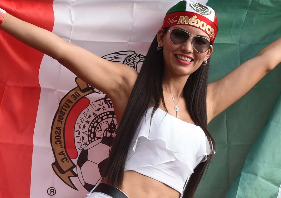 A Mexican fan poses prior to a Group A football match between Croatia and Mexico at the Pernambuco Arena in Recife during the 2014 FIFA World Cup on June 23, 2014.  AFP PHOTO / YURI CORTEZ