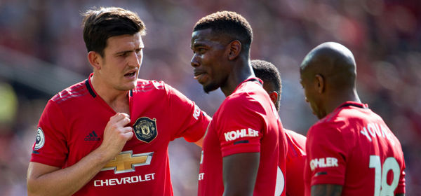 MANCHESTER, ENGLAND - AUGUST 24: Harry Maguire and Paul Pogba of Manchester United during the Premier League match between Manchester United and Crystal Palace at Old Trafford on August 24, 2019 in Manchester, United Kingdom. (Photo by Visionhaus/Getty Images)