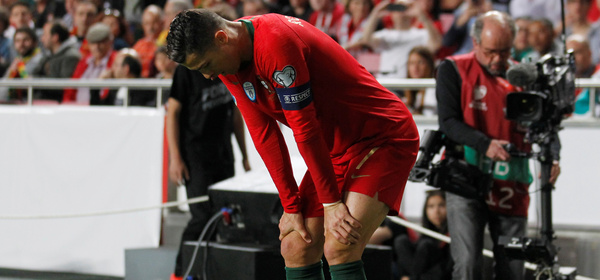 Soccer Football - Euro 2020 Qualifier - Group B - Portugal v Serbia - Estadio da Luz, Lisbon, Portugal - March 25, 2019  Portugal's Cristiano Ronaldo stands injured before being substituted off REUTERS/Rafael Marchante